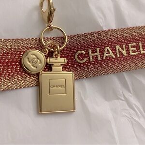 New CHANEL Double Charm with
CC and Chanel Perfume Bottle & lobster clasp
